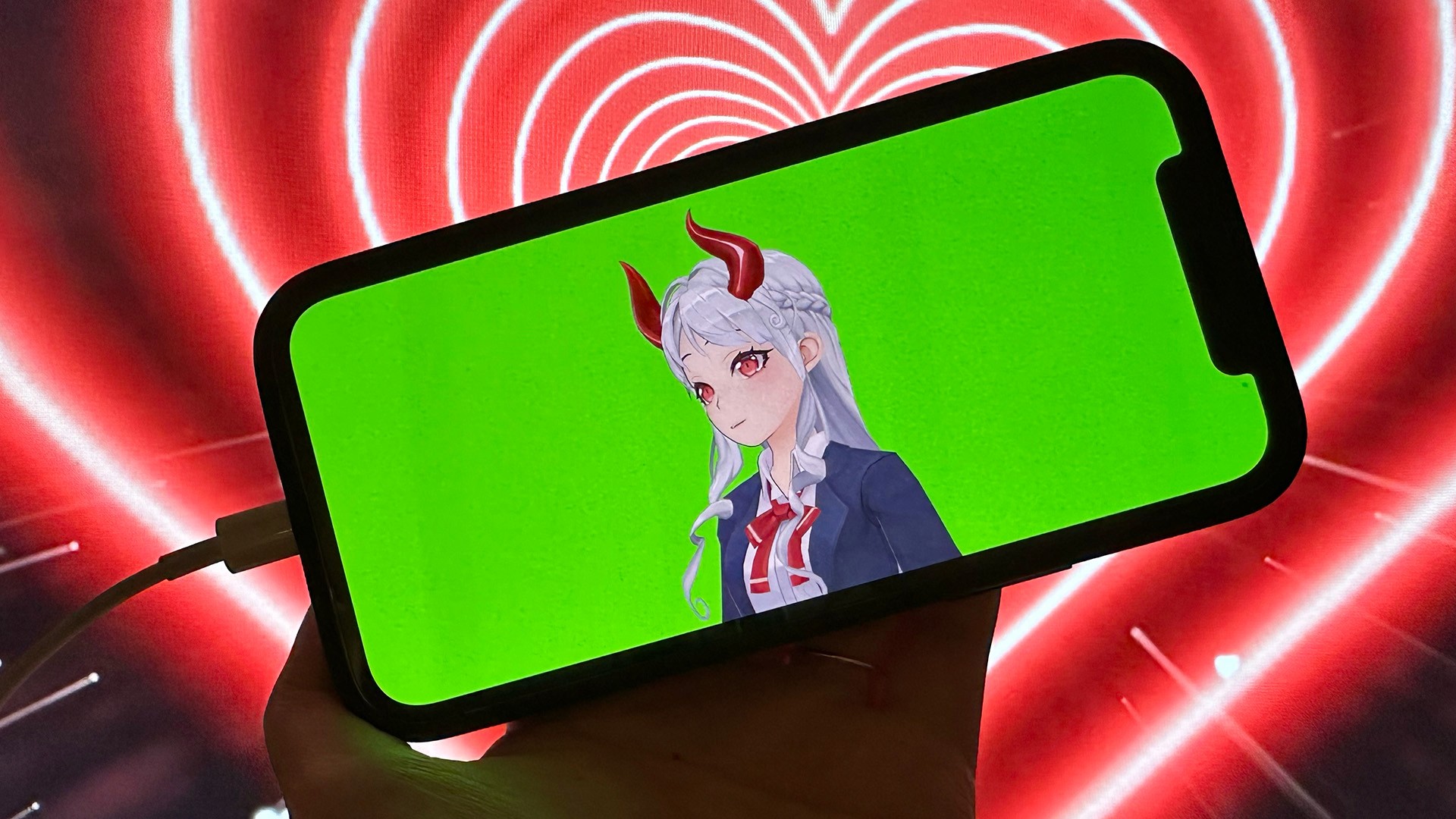 A vtuber on a mobile phone application preparing to use with OBS to stream