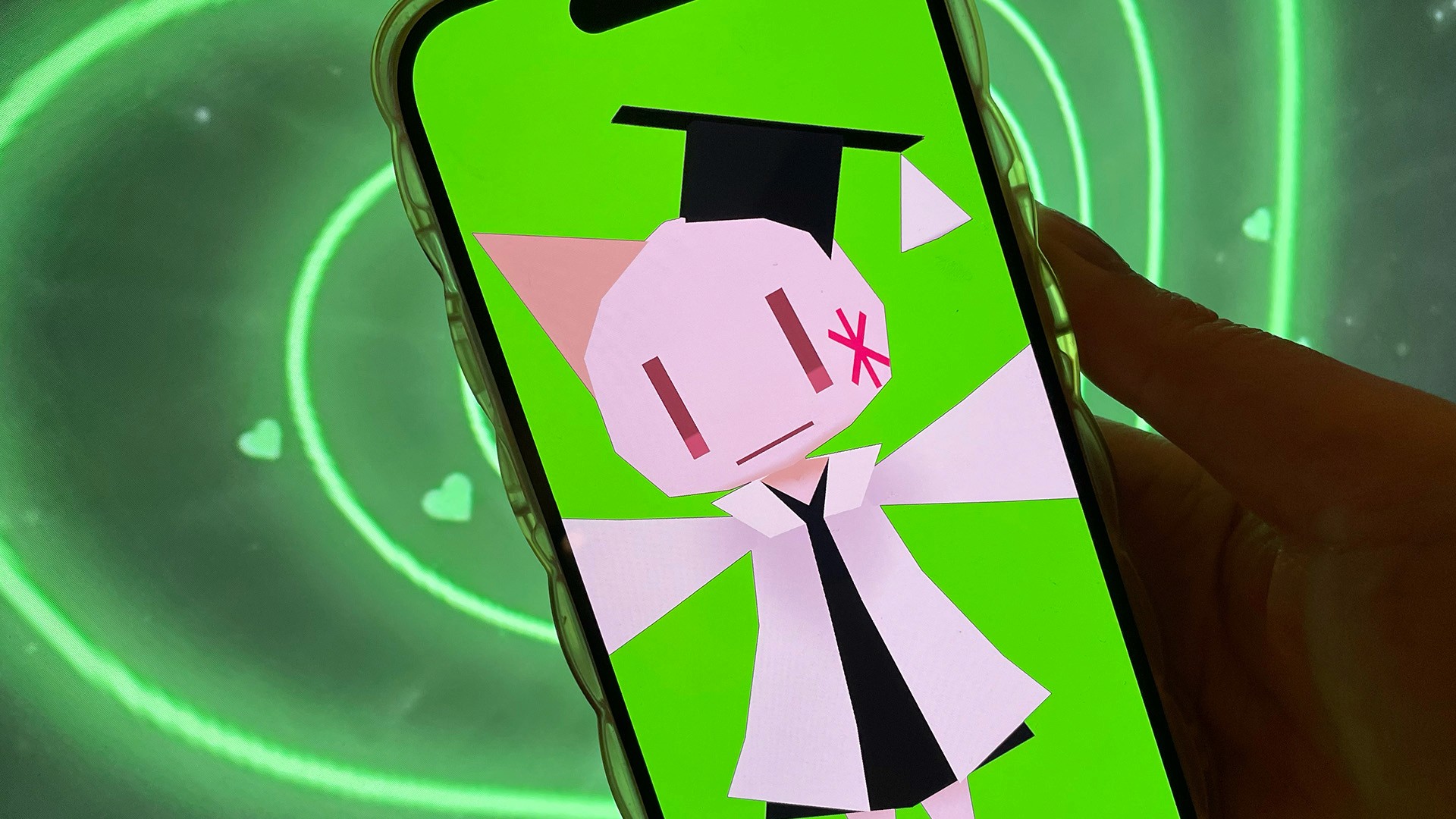 A vtuber character in front of a green screen