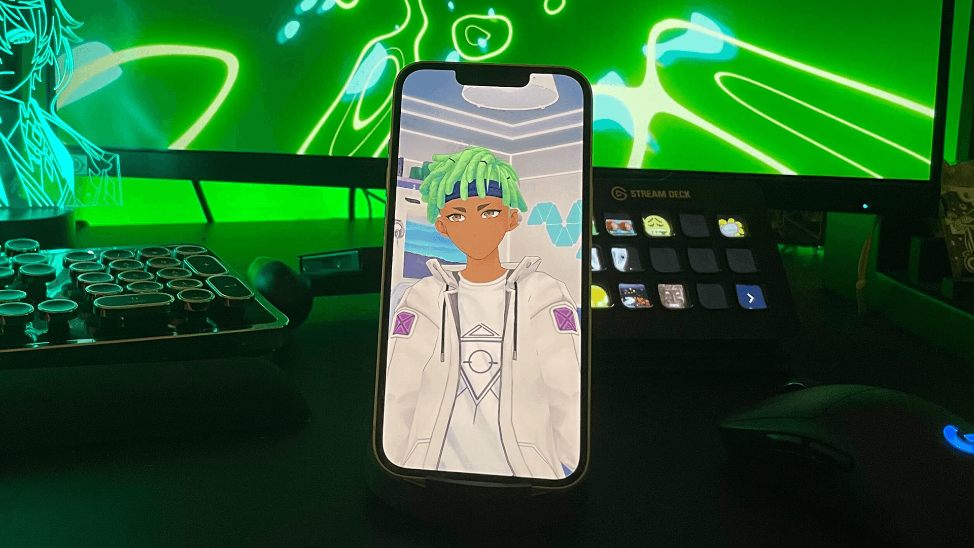 A green hair vtuber in front of an impressive streaming setup